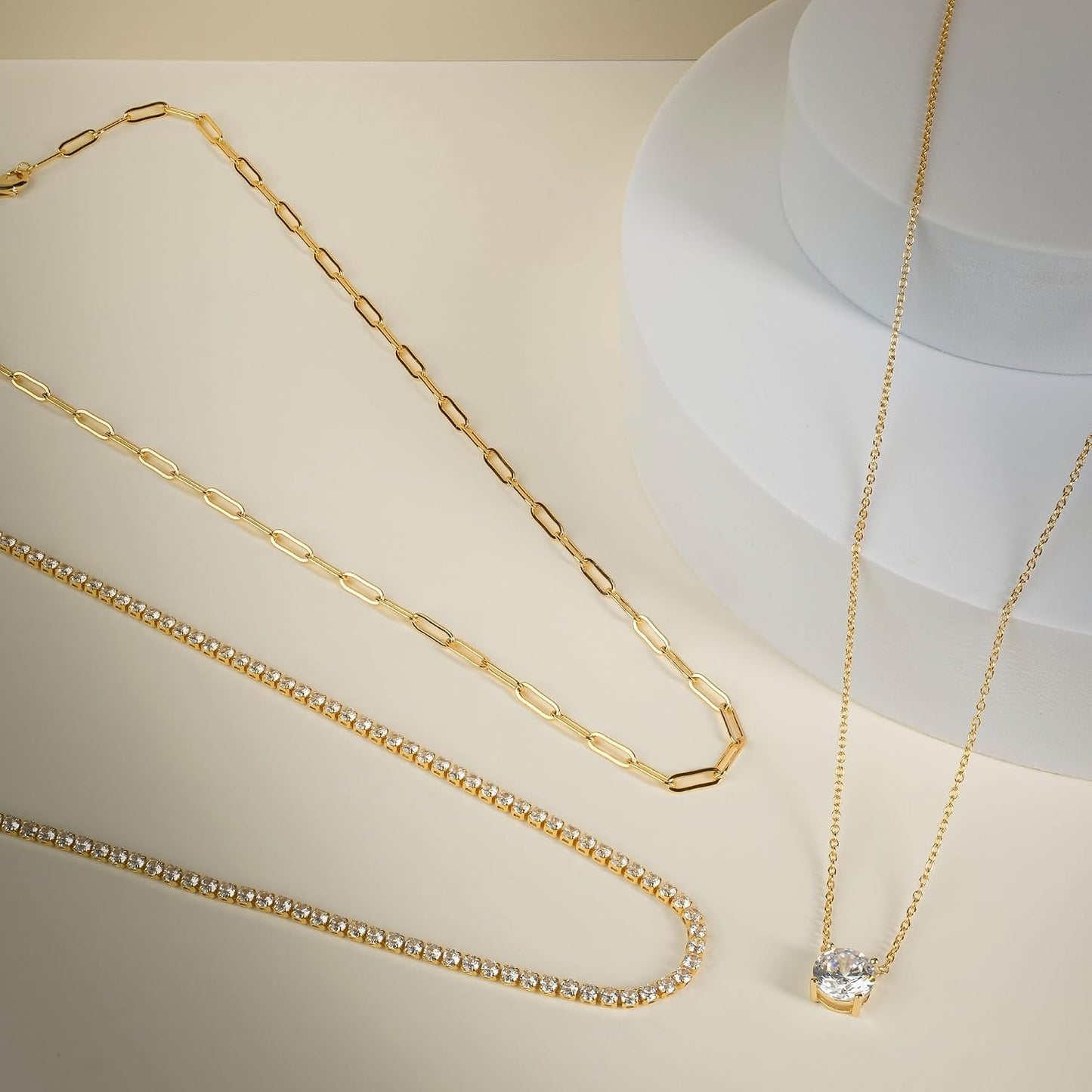 Amazon Essentials 14K Gold Plated Necklace Set of 3 - Tennis Necklace, Paperclip Necklace and Solitaire CZ Pendant - Dainty Hypoallergenic Necklaces for Women - Tennis Mindset
